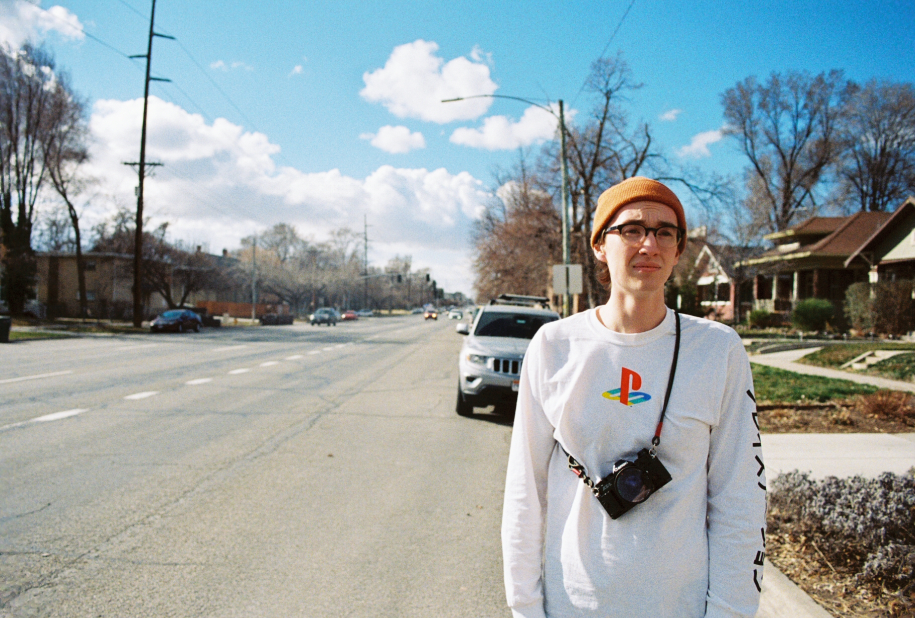Glen with a beenie hat and a Playstation shirt
