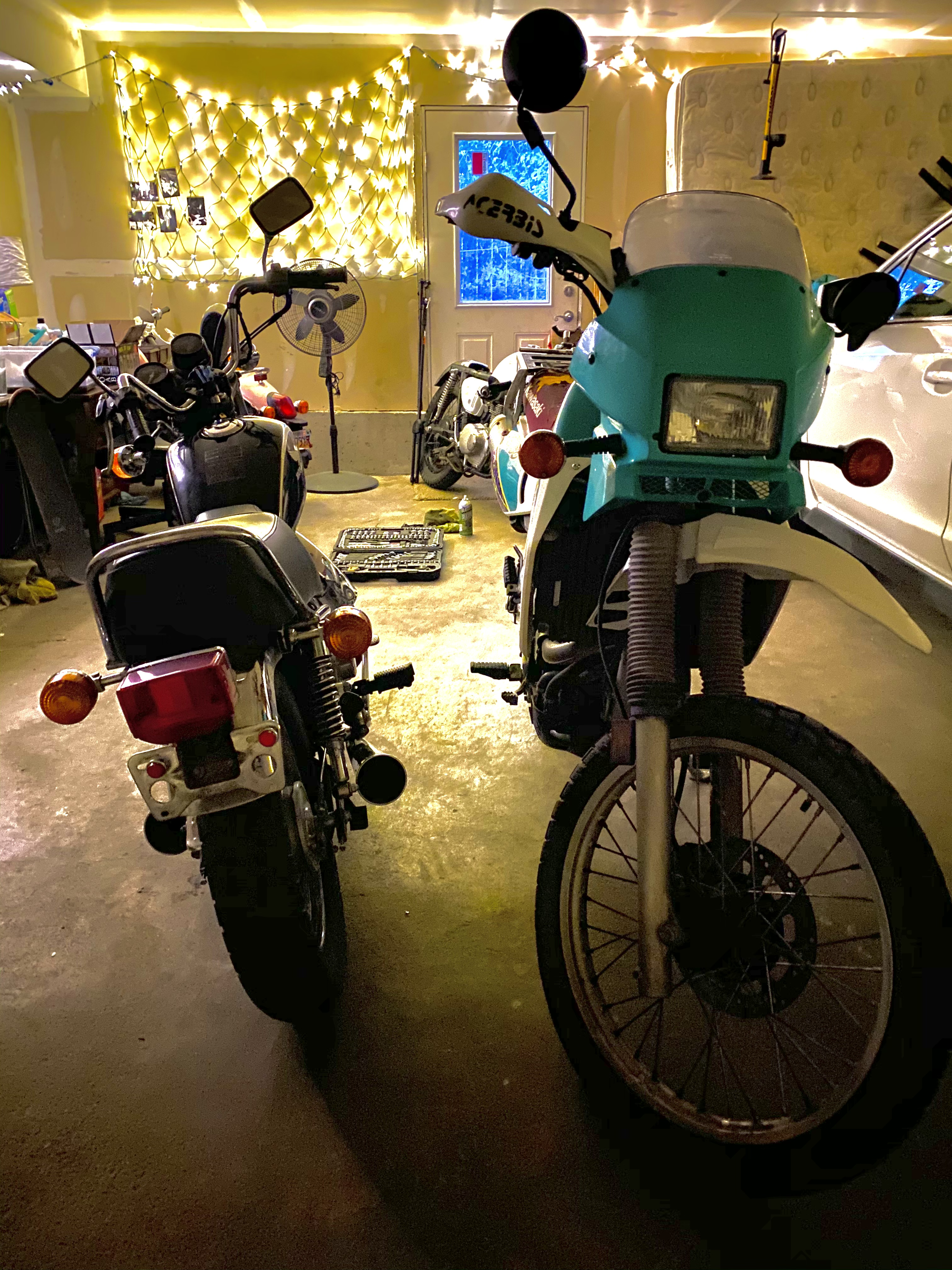 KLR and Honda in Garage